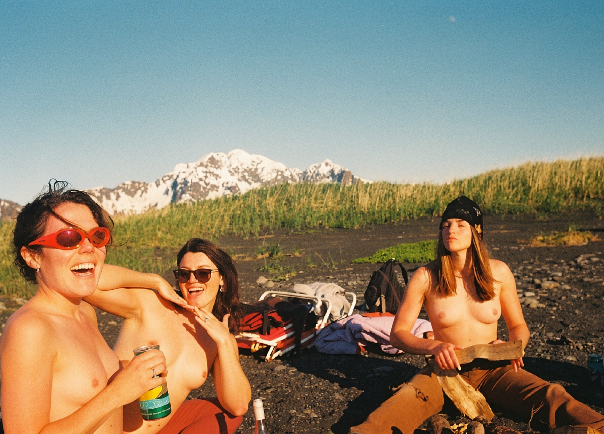 All three women are entirely unclothed. Same subjects, same poses.