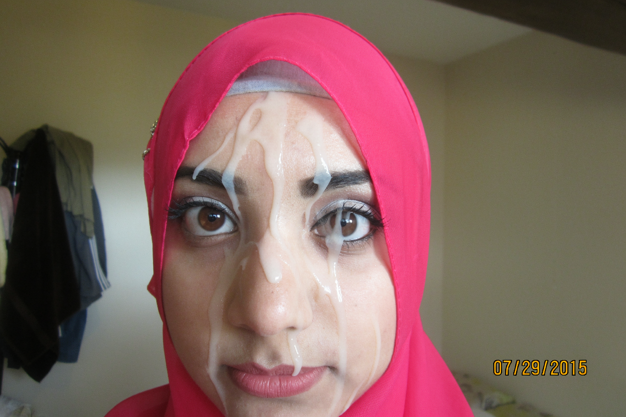 sperm is splattered all over her face and forehead