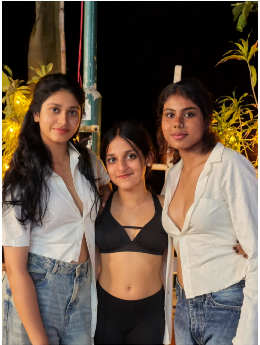 Unbutton all three of their shirts completely revealing sports bra underneath showing navel