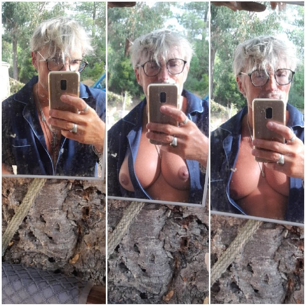 Make his pecs busty and revealing his cleavage